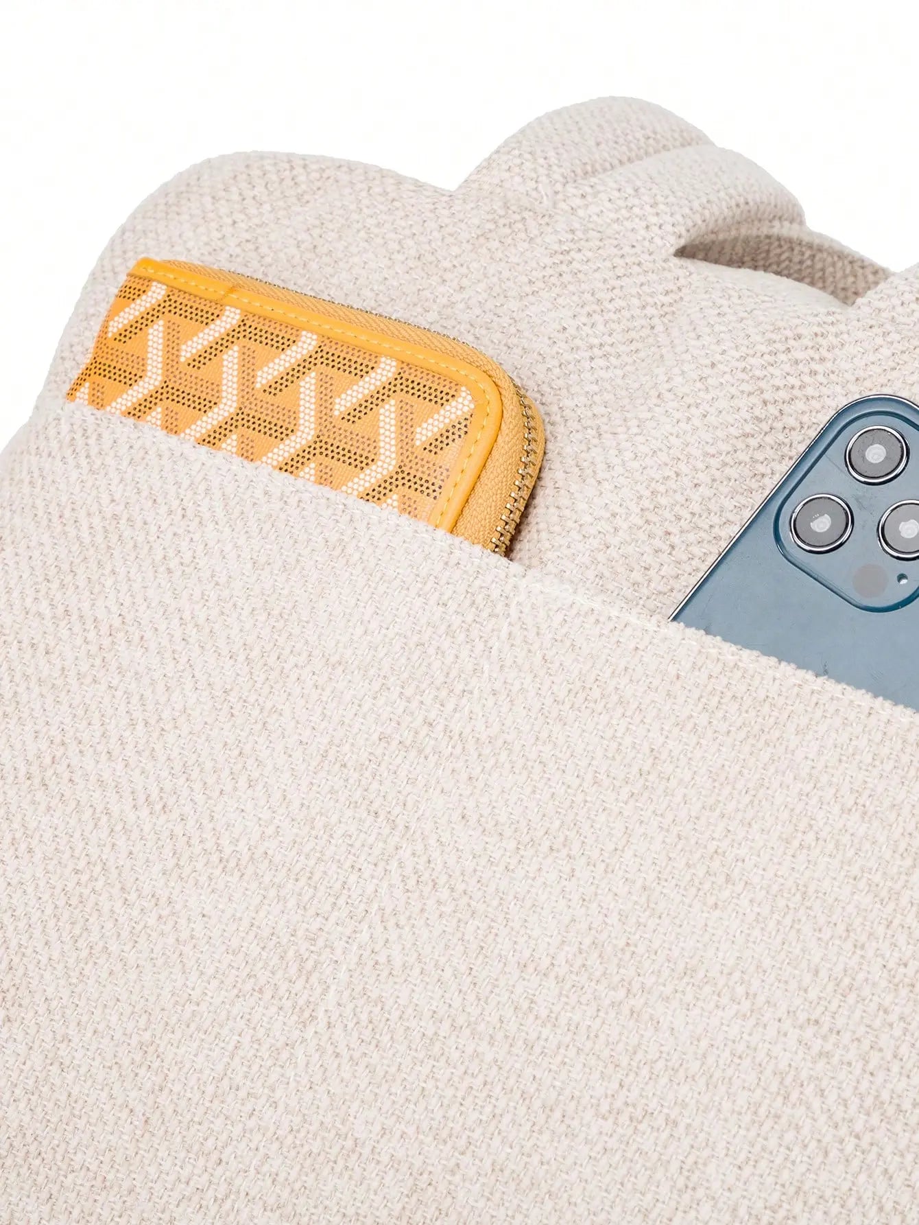 Sac à langer compact en PU effet cuir avec détails en tissu façon lin, élégant et pratique pour sorties avec bébé.