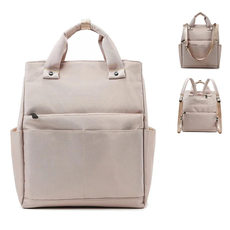 Sac à langer Noa avec accessoires rangés : couches, vêtements et biberons à portée de main