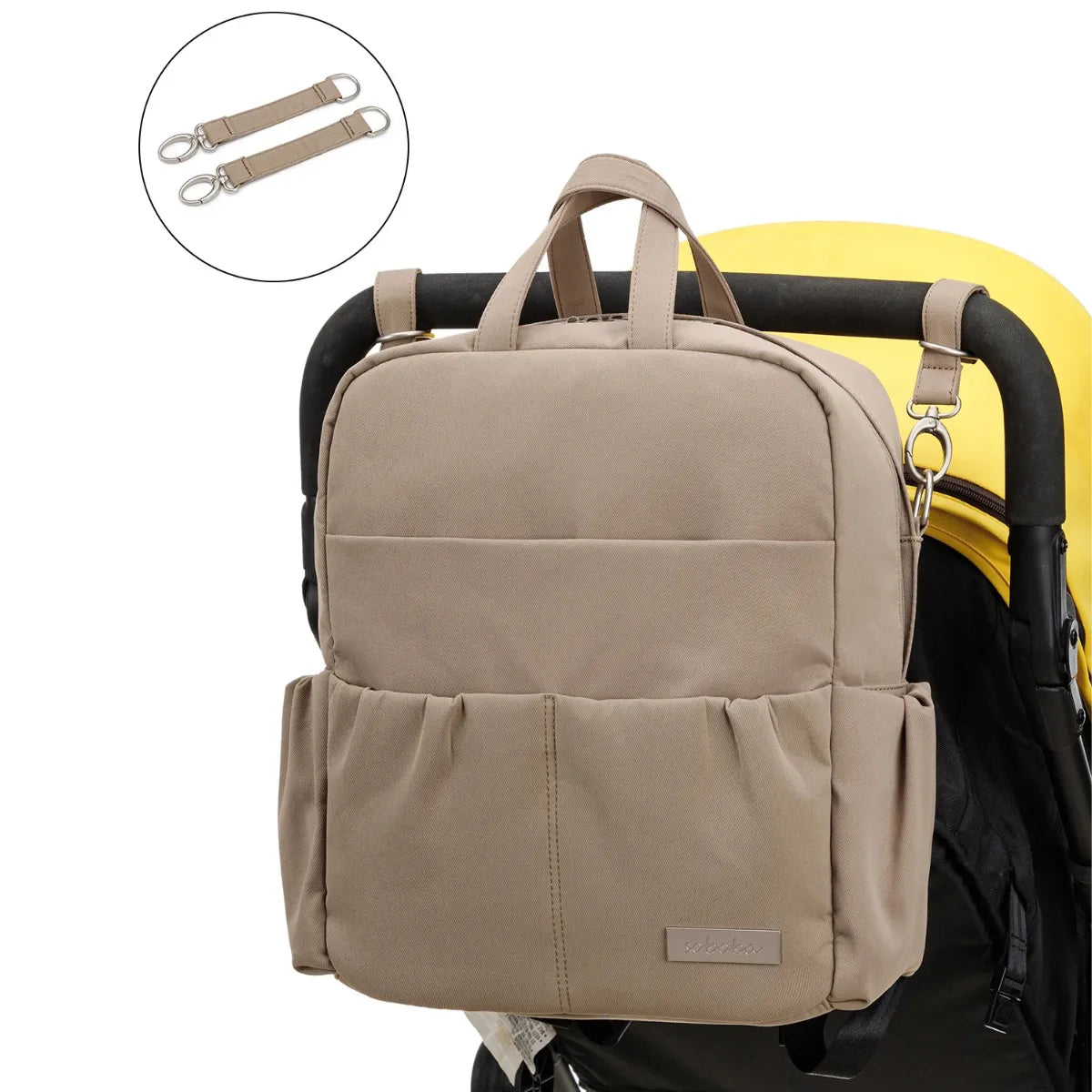 Sac à langer CarryGo porté à l’épaule avec style et confort