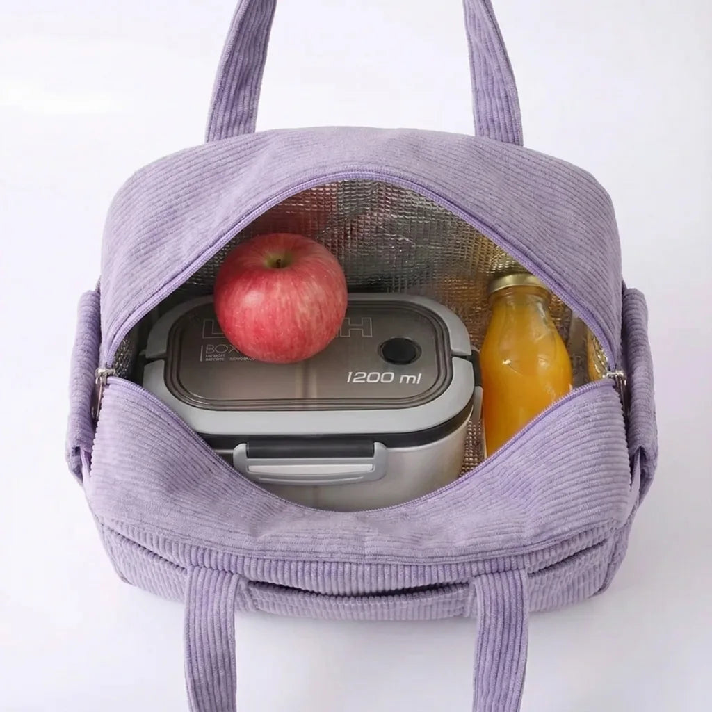 Pack Lovely Day et NomadVibe réunis pour illustrer un duo pratique et élégant pour repas frais et hydratation