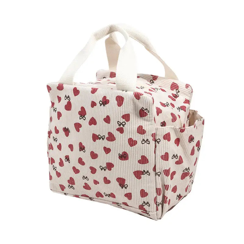 ac lunch Sweet Pouch beige motif cœur, vue côté avec poignée de transport