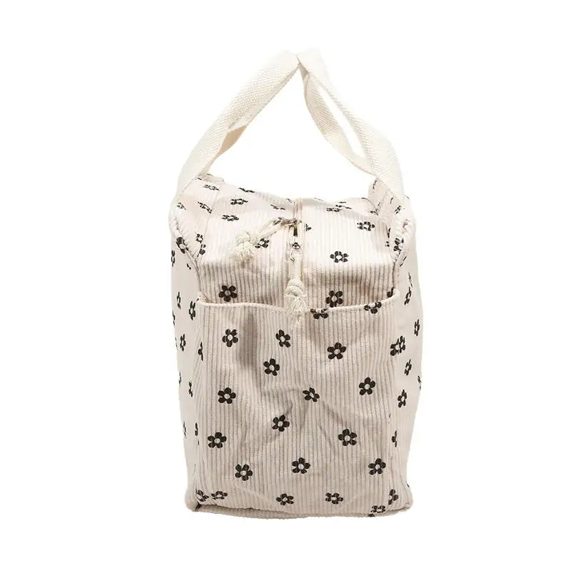 Sac lunch Sweet Pouch beige motif fleur, vue latérale montrant la texture polyester