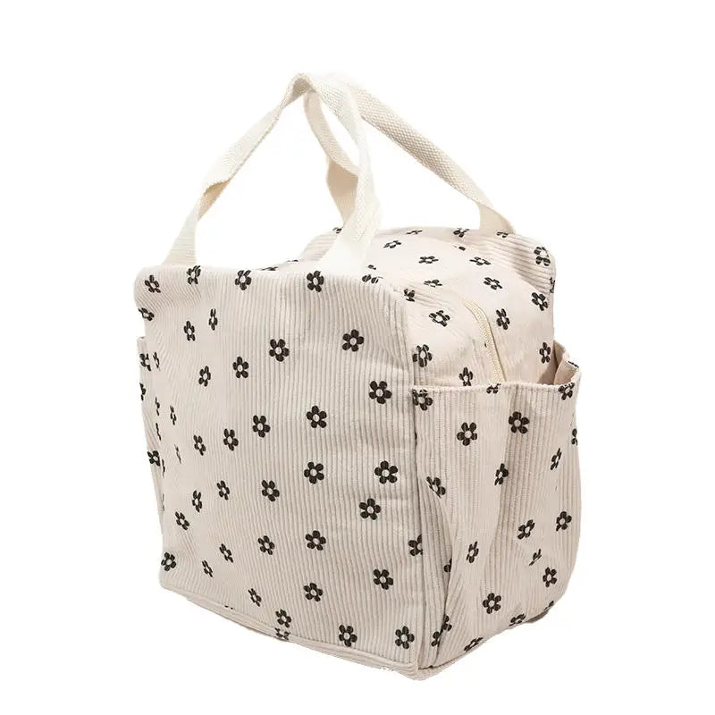 Sac lunch Sweet Pouch beige motif fleur, vue latérale montrant la texture polyester