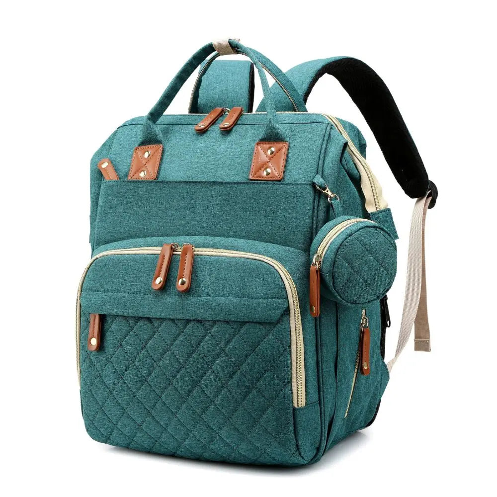 Sac à langer Globe-Trotters ouvert, avec rangements multiples pour les essentiels de bébé