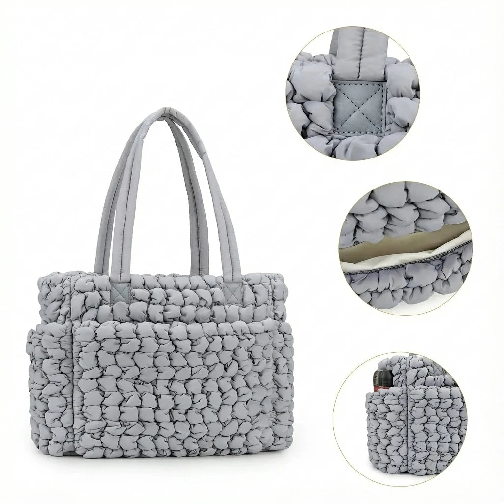 Poche latérale pour biberon sur le sac à langer Milky waterproof.