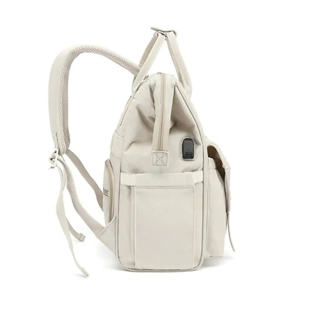 Zoom sur le tissu imperméable du sac à langer Travel, protection fiable contre les éclaboussures