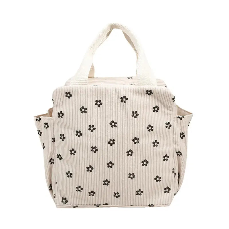 Sac à lunch motif fleur beige, vue de côté avec poigné