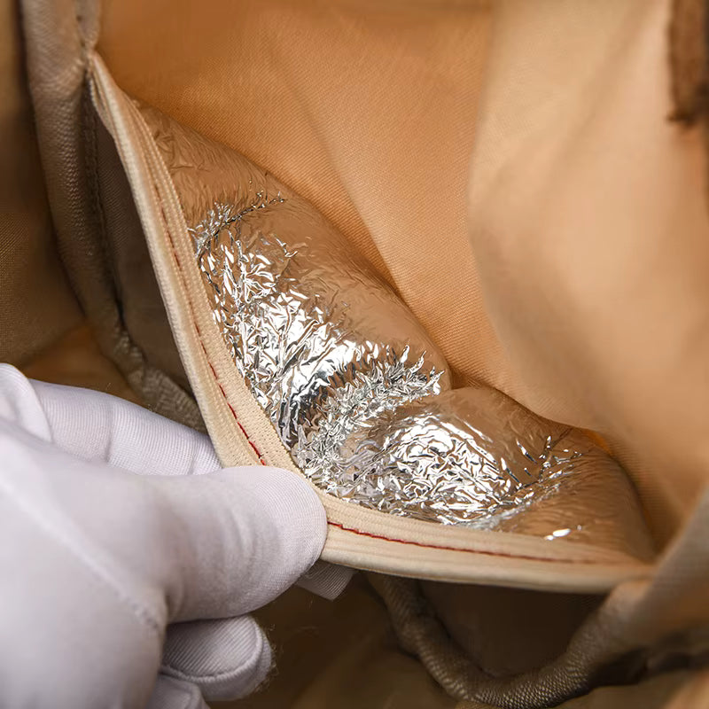 Vue intérieure du sac à langer compact avec poches organisées