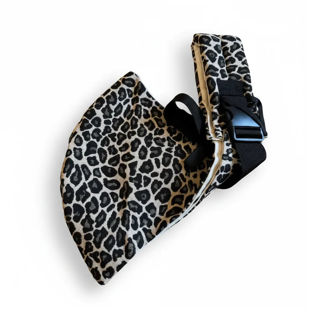 Écharpe de portage Nomade ajustable en coton pour bébé de 9 à 36 mois, supportant jusqu'à 20 kg.