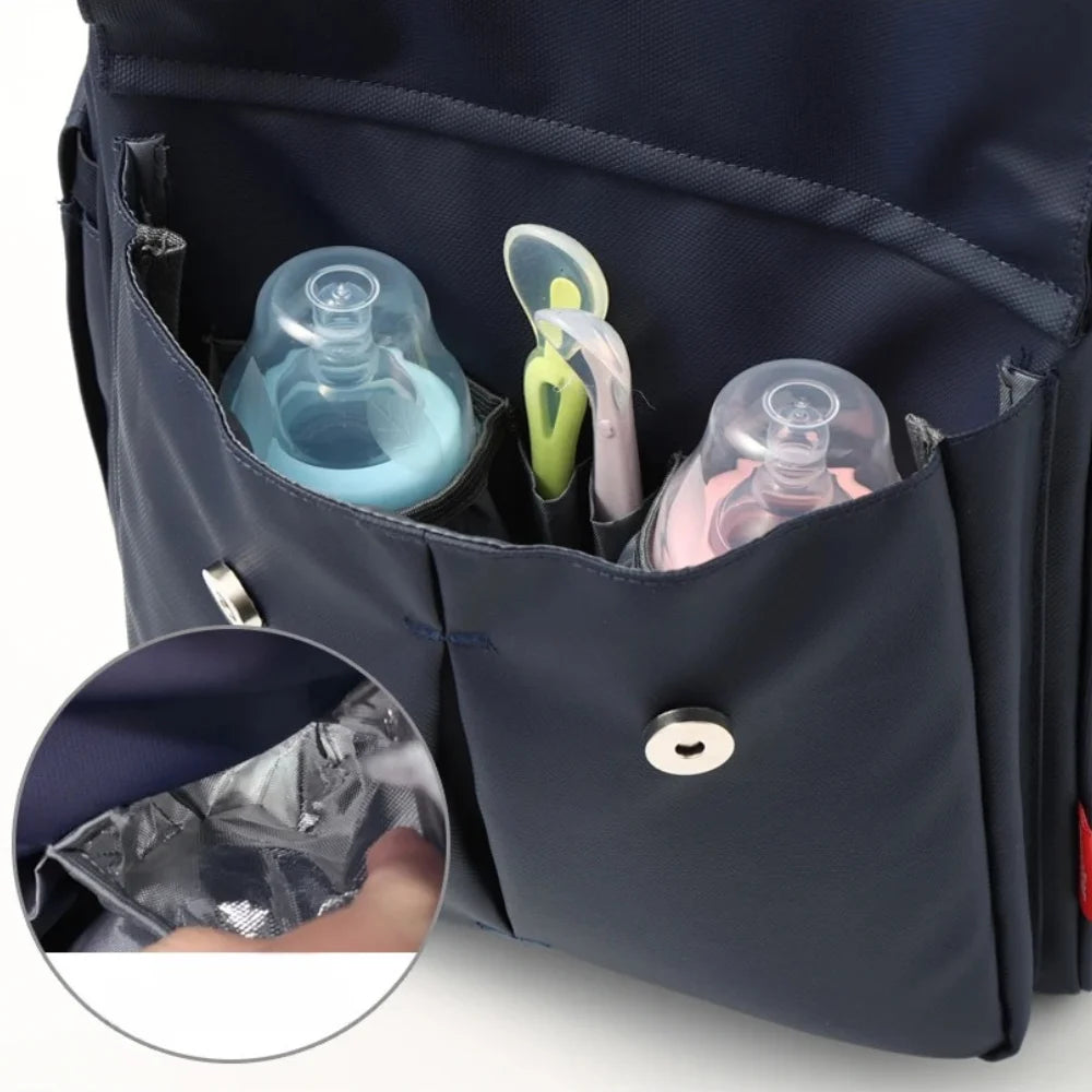 Zoom sur le tissu déperlant du sac à langer Noa Pop