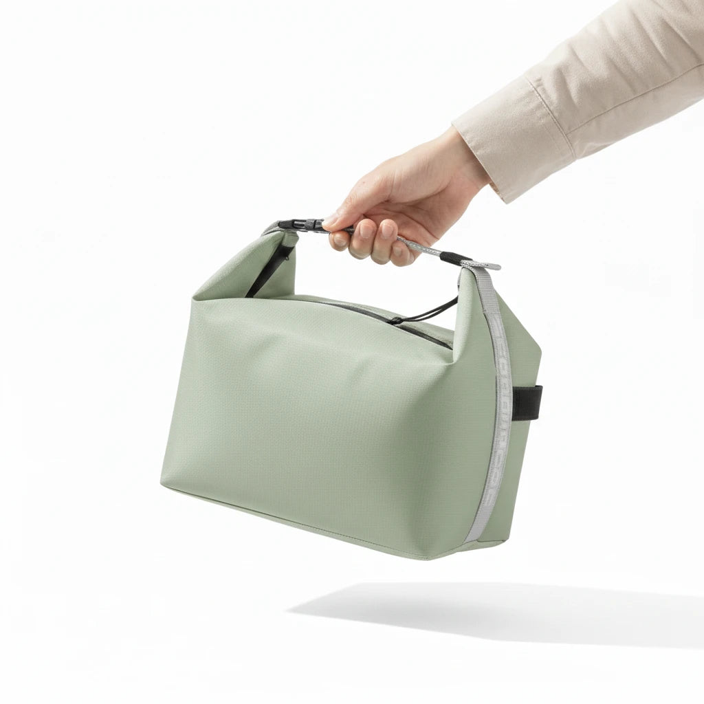 NomadBox Rose Poudré – Lunch bag portable à la main
