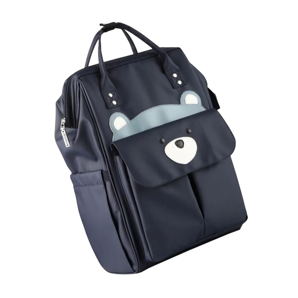 Sac à langer Noa Pop Éclat Soleil porté à la main lors d’une sortie
