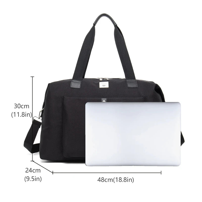 Sac à langer MoodPack ouvert, montrant les rangements pour repas, gourde et affaires perso

