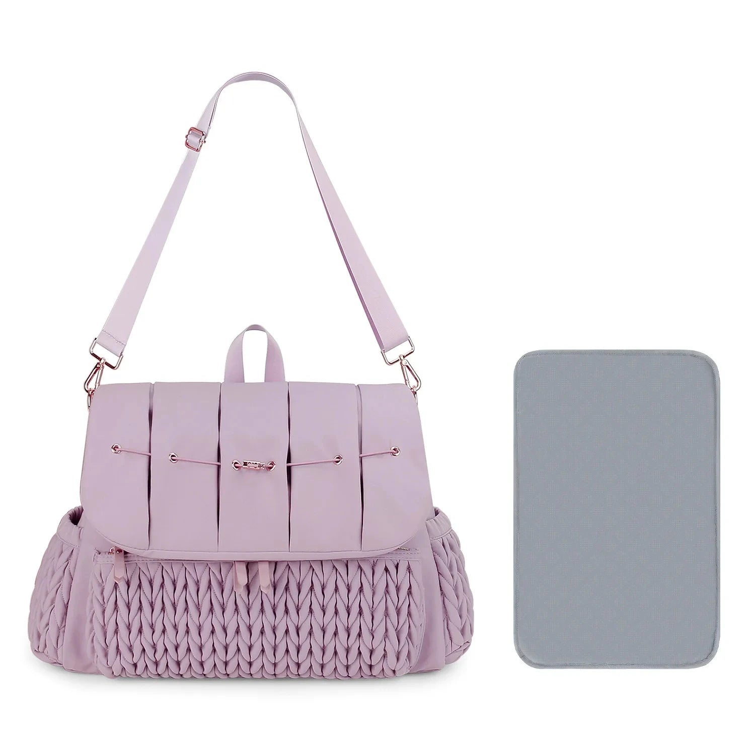 Sac à langer avec poches latérales pratiques


