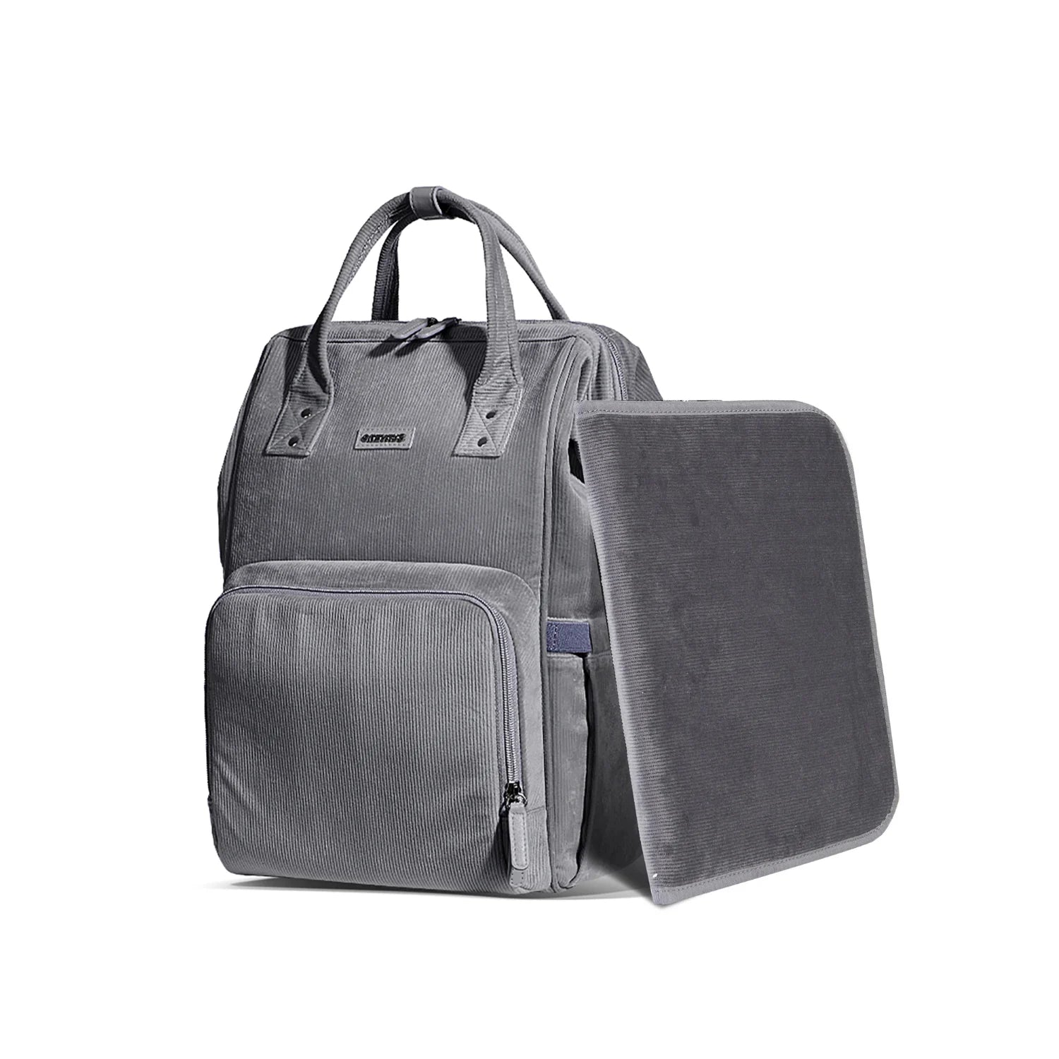 Sac à dos à langer haut de gamme en tissu doux, avec matelas assorti pour change facile en déplacement

