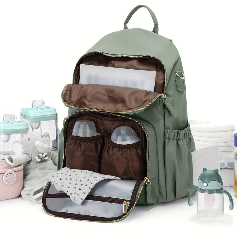 Détail des crochets assortis inclus avec le sac à langer Goodnvibes 35L

