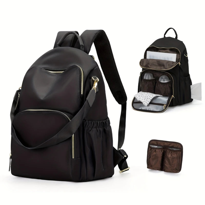 Sac à dos à langer en nylon 35L noir posé sur une poussette avec crochets assortis

