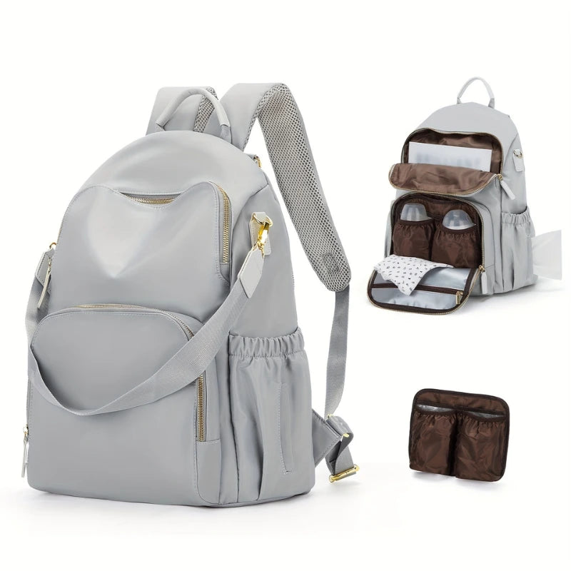 Organisation intérieure du sac à langer Goodnvibes avec accessoires bébé bien rangés

