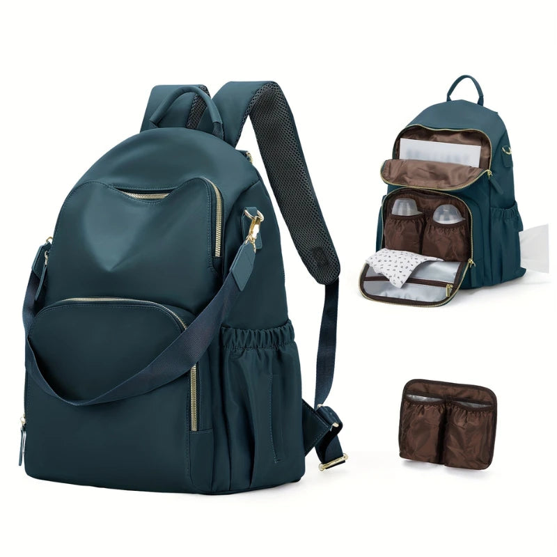 Sac à langer pratique et élégant en nylon noir, posé sur un banc en extérieur

