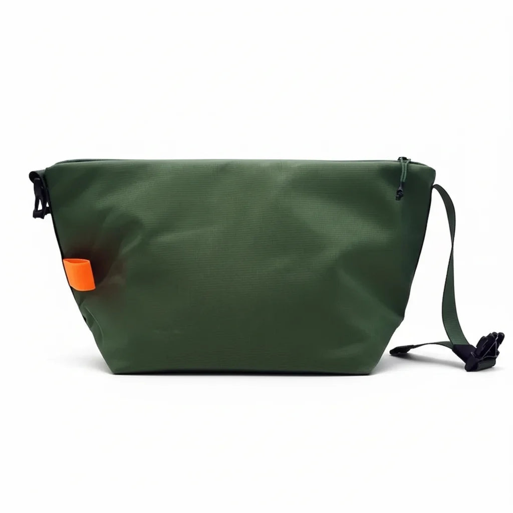 NomadBox isotherme portée à la main, tissu Oxford et coton perlé, idéale pour repas chauds ou froids.