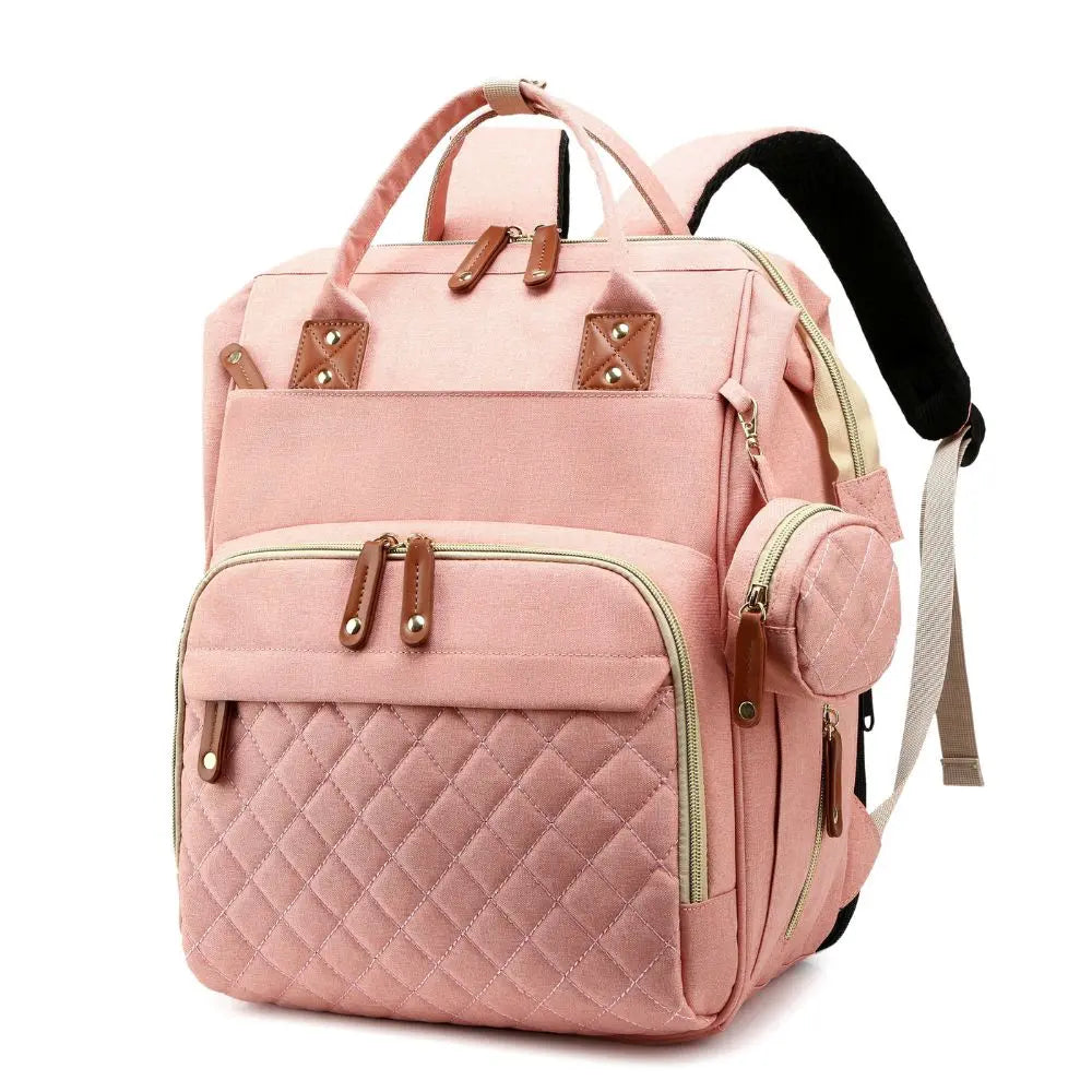 Sac à dos à langer Globe-Trotters porté par un parent, pratique et unisexe pour les balades et voyages avec bébé