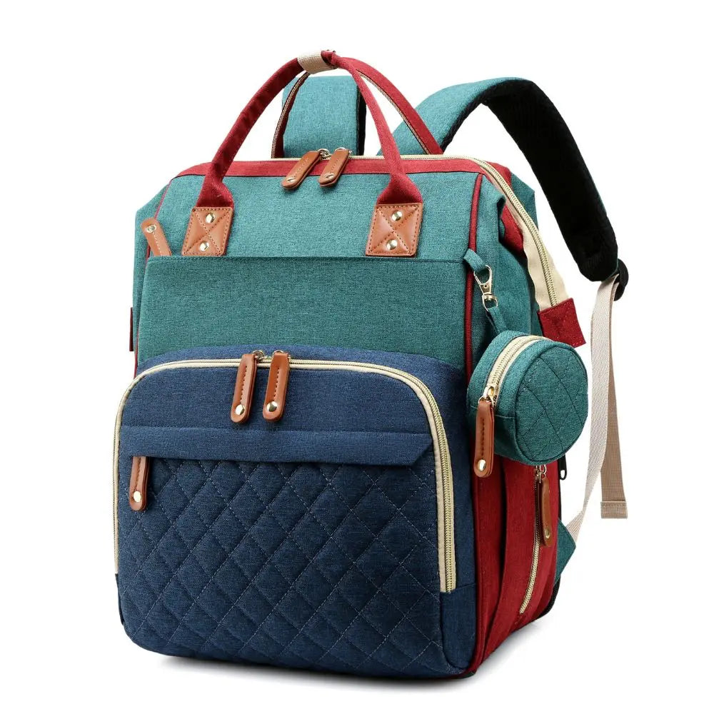 Sac à dos à langer Globe-Trotters avec tapis à langer intégré, format déplié 95 cm, idéal pour les sorties nomades