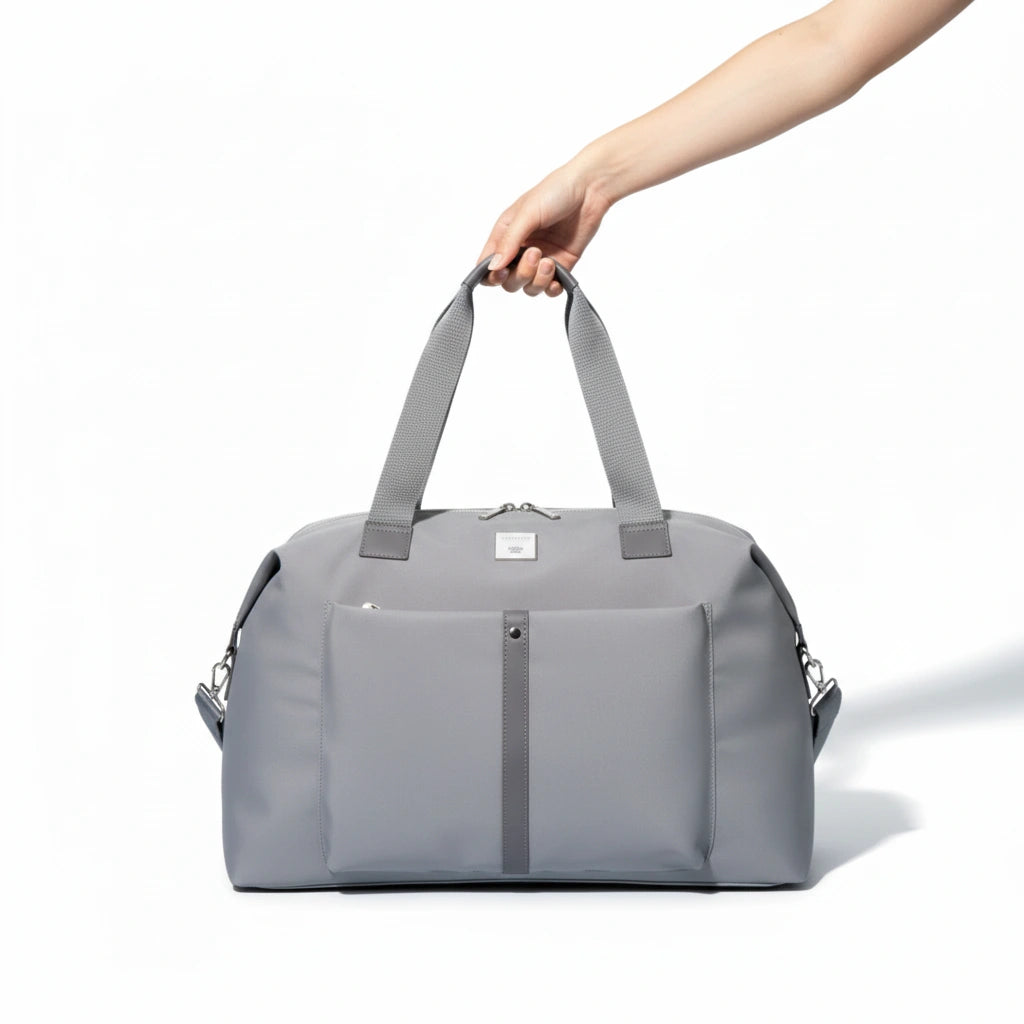 Sac à langer moderne MoodPack avec accroche poussette et ouverture zippée rapide
