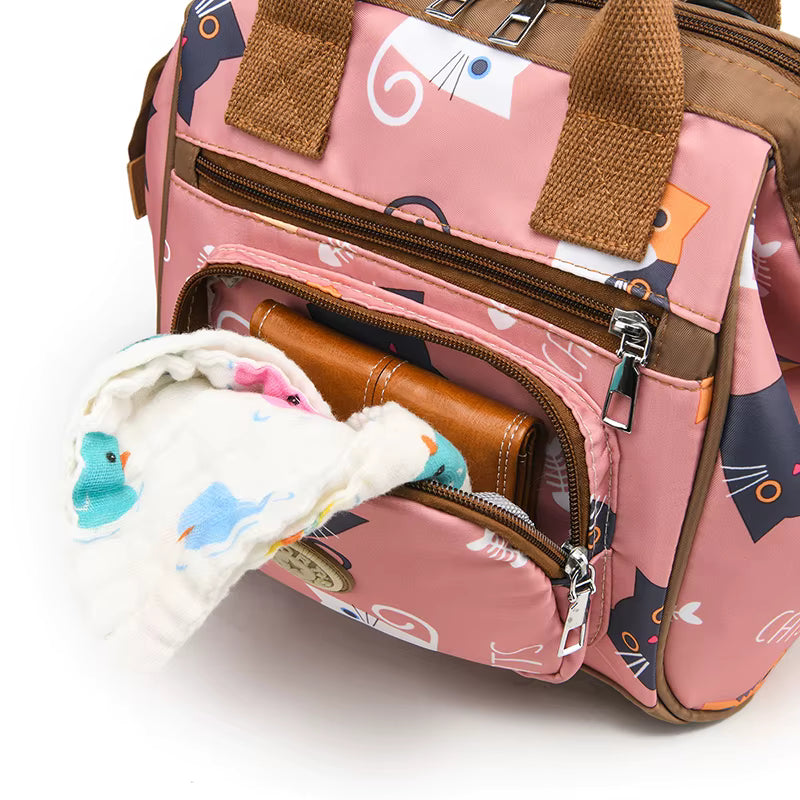 Détails de la bandoulière ajustable du sac à langer Pocket Chic