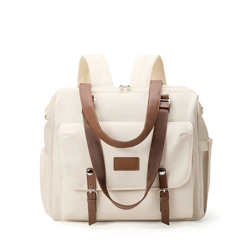 Sac à langer bourgogne élégant, pratique et spacieux pour sorties avec bébé

