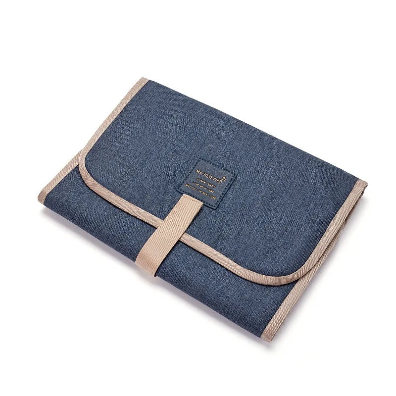 Matelas à langer en nylon et PEVA, imperméable, dimensions fermé 31x21x1,5 cm, dimensions ouvert 58x30x1 cm, facile à nettoyer avec un chiffon microfibre humide bleu