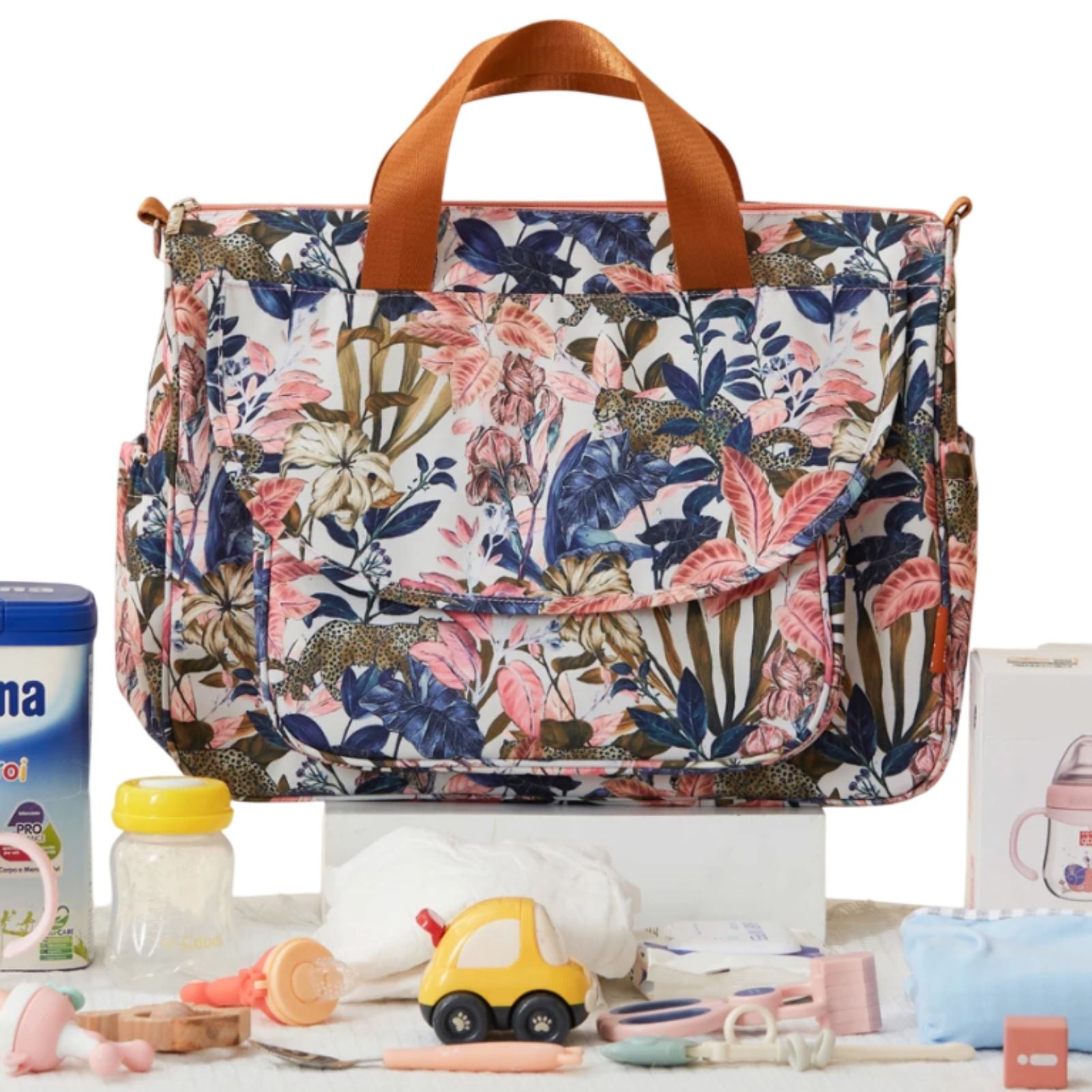 Détail du tissu imperméable anti-taches du sac à langer Linoa sous la lumière
