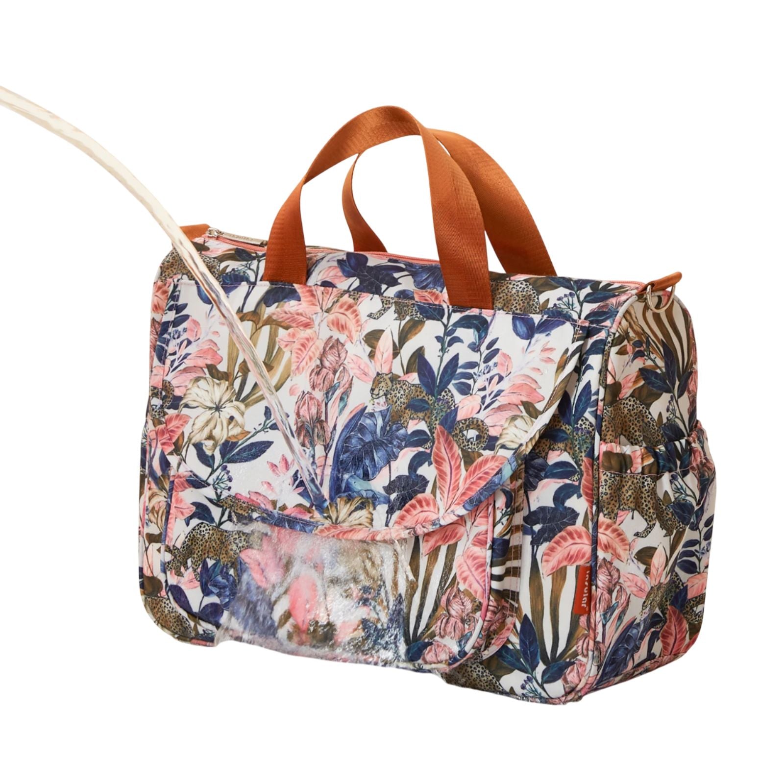 Sac à langer Linoa posé sur une table avec accessoires de bébé
