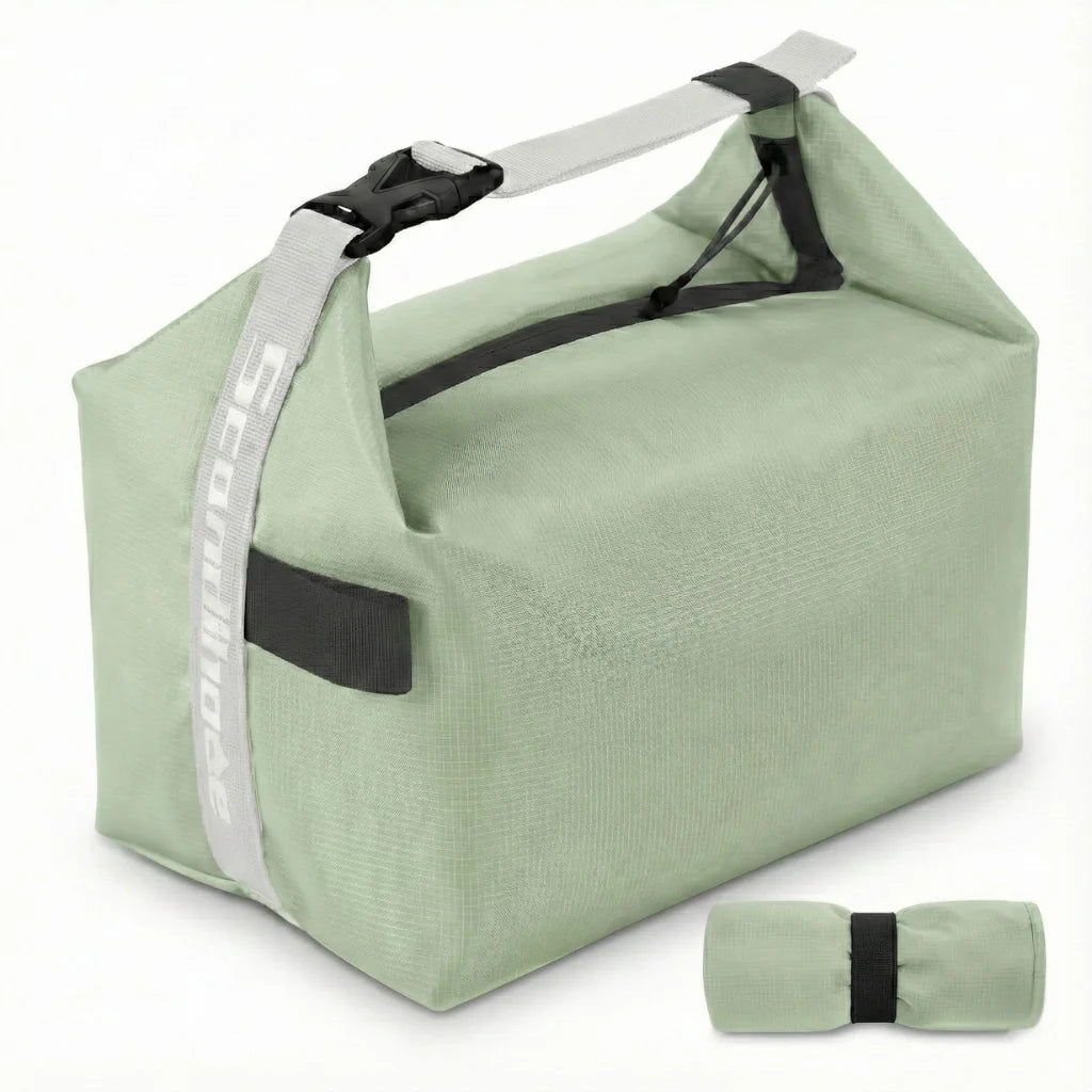 Sac repas enroulable et compact avec sangle ajustable pour un gain de place optimal dans le sac