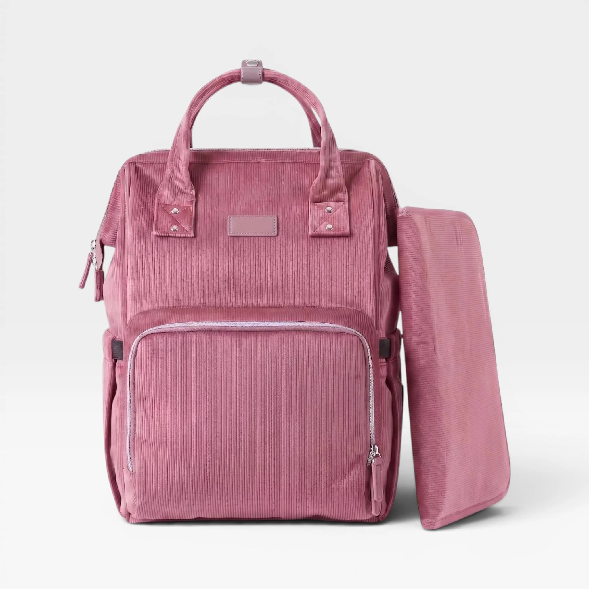 Sac à dos à langer tendance vieux rose en velours côtelé idéal pour maman active.